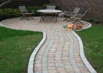 Functional and stylish patios in Newton Abbot by Stone Mark Contractors. High-quality patio installation by Stone Mark Contractors in Newton Abbot, Devon, creating a functional and visually appealing outdoor space.