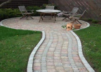 Functional and stylish patios in Newton Abbot by Stone Mark Contractors. High-quality patio installation by Stone Mark Contractors in Newton Abbot, Devon, creating a functional and visually appealing outdoor space.