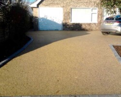 Resin driveways across Devon by Stone Mark Contractors. Stone Mark Contractors’ resin driveway across Devon, providing a smooth, durable, and visually appealing outdoor surface.