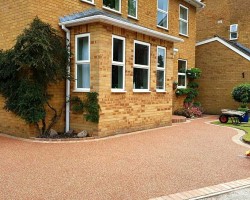 Durable and elegant resin driveways in Exeter by Stone Mark Contractors. Expertly installed resin driveway by Stone Mark Contractors in Exeter, Devon, offering both aesthetic appeal and durability.