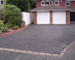 Stone Mark Contractors delivering high-quality Tarmac driveways in Devon. Expert Tarmac driveway installation by Stone Mark Contractors in Devon, built to withstand heavy use and weather conditions.